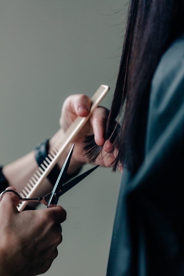 a-stylist-measures-before-cutting
